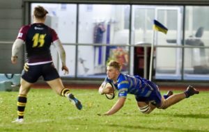 Jack Kenningham dives over for Team Bath's opening try against Cardiff Met